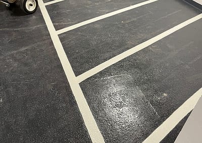 White Parking Lot Line Painting Tricar